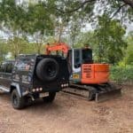 Excavator and a Car — Electrician in Yarrawonga NT
